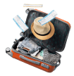 An open suitcase displaying a hat and various travel items, symbolizing adventure and exploration in tourism.